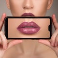 Macro perfect lip makeup. Macro photo of the face details. Lipstick shades of red. Gloss lips