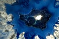 Macro photo of a blue agate rock slice.