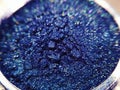 Macro photo blue eye shadow pigment glitter gloss cosmetic make up Royalty Free Stock Photo