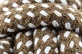 Macro photo of a brown rope with white details made of cotton and jute. Royalty Free Stock Photo