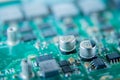 Macro photo of a circuitboard detail with transistors and integrated circuits Royalty Free Stock Photo