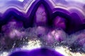 Macro photo of a colorful purple agate rock slice. Royalty Free Stock Photo