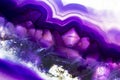 Macro photo of a colorful purple agate rock slice. Royalty Free Stock Photo