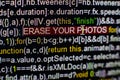 Macro photo of computer screen with program source code and highlighted SPYWARE inscription in the middle. Script on the Royalty Free Stock Photo