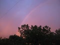 Macro photo with a decorative background of a natural physical phenomenon of a rainbow in the sky with the decomposition of light