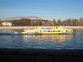 Macro photo with a decorative natural background of a river boat with tourists on the Moscow River in the capital of Russia