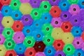 Macro photo of different colored plastic beads Royalty Free Stock Photo