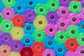 Macro photo of different colored plastic beads Royalty Free Stock Photo