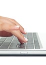 Macro photo of female hand typing on laptop Royalty Free Stock Photo