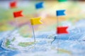 Macro photo with flag pushpins and world map.Travel concept Royalty Free Stock Photo