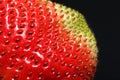Macro photo of fresh red strawberry seeds. Texture of the red surface of the strawberry berries closeup Royalty Free Stock Photo