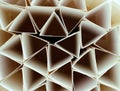 Macro photo of geometric shapes of paper in black and white, three-dimensional triangles, abstract background