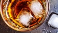macro photo of glass with whiskey and ice cubes top view Royalty Free Stock Photo