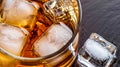 macro photo of glass with whiskey and ice cubes top view Royalty Free Stock Photo