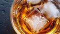 macro photo of glass with whiskey and ice cubes top view Royalty Free Stock Photo