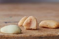 macro photo of nuts on a wooden table, peanuts, beer snacks, blurred background Royalty Free Stock Photo