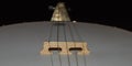 Old dusty white and brown banjo bridge and strings on a black background Royalty Free Stock Photo