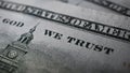 Macro photo of part of slogan In God We Trust on the US banknote. Business and finance concept. Selective focus Royalty Free Stock Photo