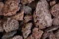 Macro photo of red volcanic lava stones. Royalty Free Stock Photo