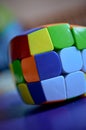 Macro photo of a rubik\'s cube with mixed colors