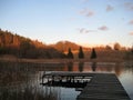 Macro photo with rural landscape decorative background of evening sunset in early spring on the lake in Lithuania Royalty Free Stock Photo