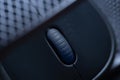 macro photo. Single wireless computer mouse on a dark gray background Royalty Free Stock Photo