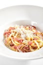 Macro Photo of Spaghetti Carbonara with Grated Parmesan and Bacon Royalty Free Stock Photo