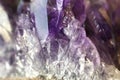 macro photo of sparkling crystals of white, magenta and violet amethyst Royalty Free Stock Photo