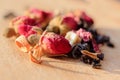 Macro photo of tea with a tea rose. The composition of the heap