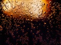 macro photo of the texture of bubbles in a glass of refreshing cold cola with ice Royalty Free Stock Photo