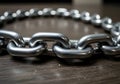 Macro photo of tightly connected chain links symbolizing strength, connection, and reliability in teamwork setting, placed on Royalty Free Stock Photo