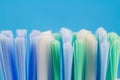 Macro photo of toothbrush isolated on blue background. Royalty Free Stock Photo