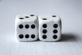 Macro photograhpy to an Old white dices with double six pair over Royalty Free Stock Photo