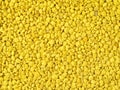 A macro photograph of bee pollen granules in intimate detail