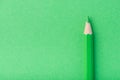 Macro photograph of several pencils of green color on a paper ba Royalty Free Stock Photo