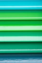 Macro photograph of several pencils of green color on a white ba Royalty Free Stock Photo