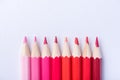 Macro photograph of several pencils of red color on a white background Royalty Free Stock Photo