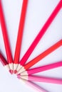 Macro photograph of several pencils of red color on a white background Royalty Free Stock Photo