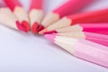 Macro photograph of several pencils of red color on a white background Royalty Free Stock Photo