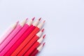 Macro photograph of several pencils of red color on a white background Royalty Free Stock Photo