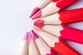 Macro photograph of several pencils of red color on a white back Royalty Free Stock Photo