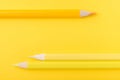 Macro photograph of several pencils of yellow and orange color o Royalty Free Stock Photo