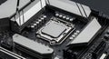 Close-up view of a modern computer motherboard featuring the bare central processing unit socket. Royalty Free Stock Photo