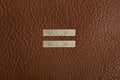 Macro photography. Detail of a brown leather female bag. Two metal label for your text Royalty Free Stock Photo