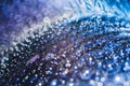 Macro photography of flowers. Water drops on iris petals. Blue petal abstract floral background