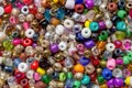 Macro photography of a heap of assorted colorful plastic beads Royalty Free Stock Photo