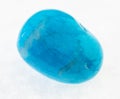 tumbled blue howlite (turquenite) stone on white