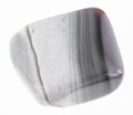 tumbled gray flint stone on white Royalty Free Stock Photo