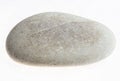 tumbled gray river pebble stone on white