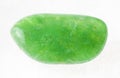 tumbled green agate (chalcedony) stone on white